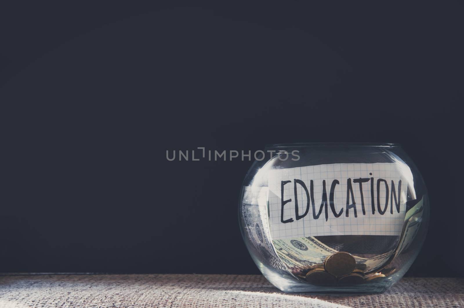 Label on a glass jar with the inscription - education by natali_brill