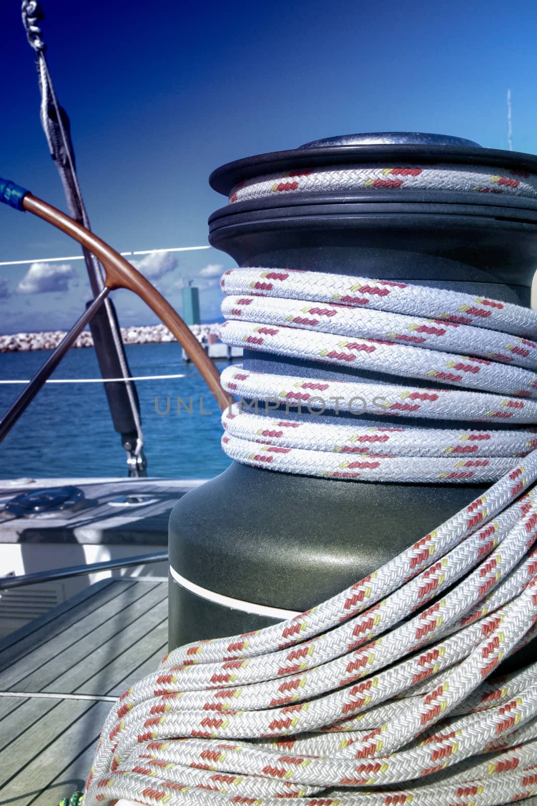 Yacht. Yachting. Sailboat Winch and Rope Yacht detail.