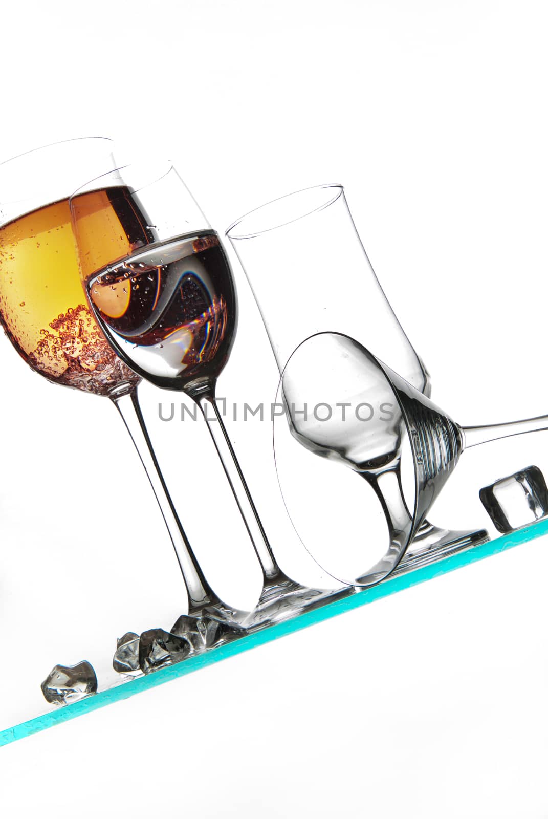 Liquid in the glass on a studio background