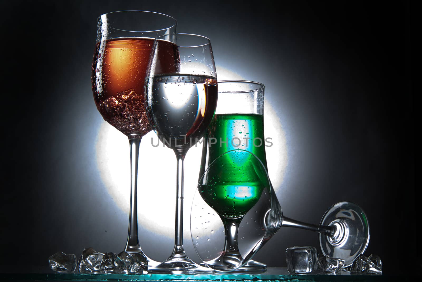 Liquid in the glass on a studio background