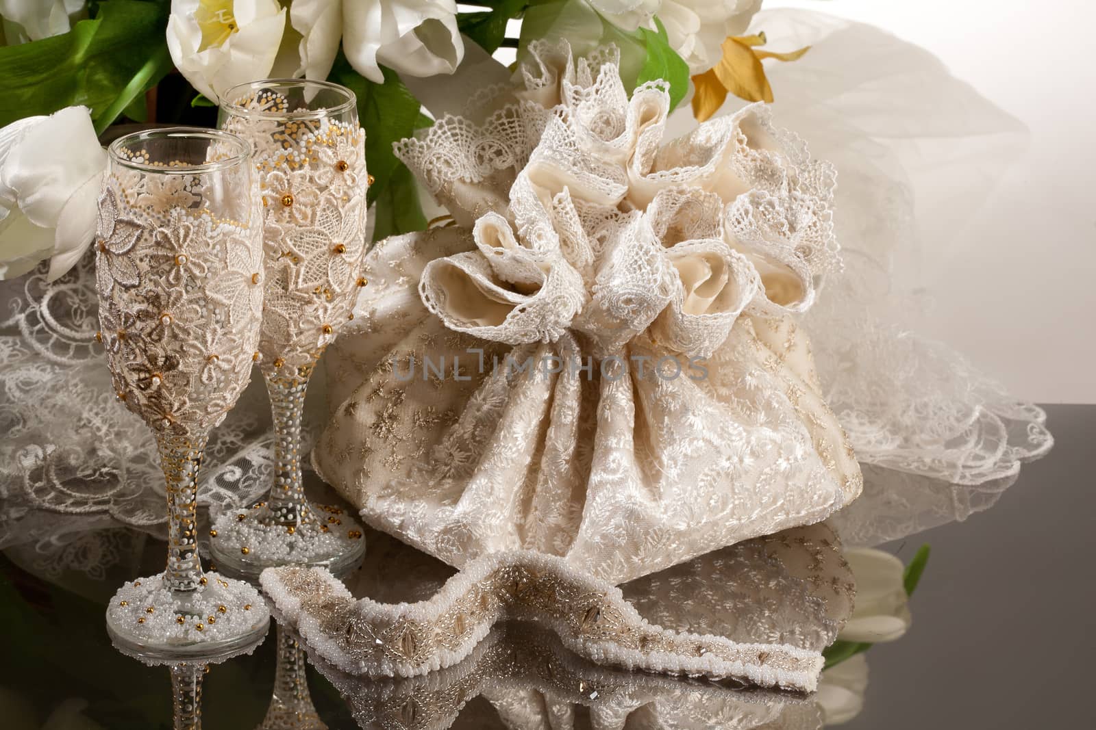 Fabric handmade bag for gift on a glass background
