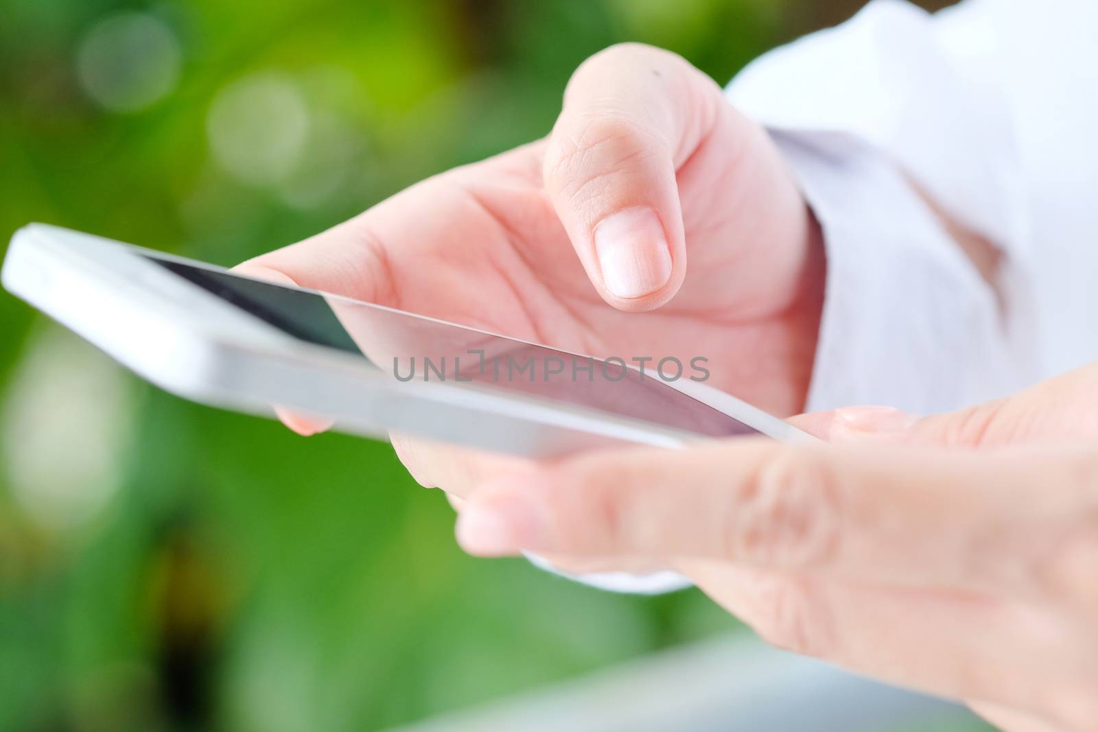 Image of Woman hand Using a Smart Phone background,communication