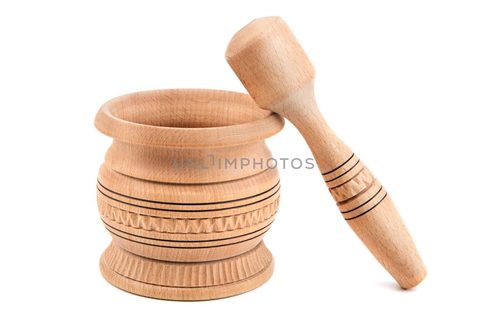 wooden pestle and mortar isolated on white background