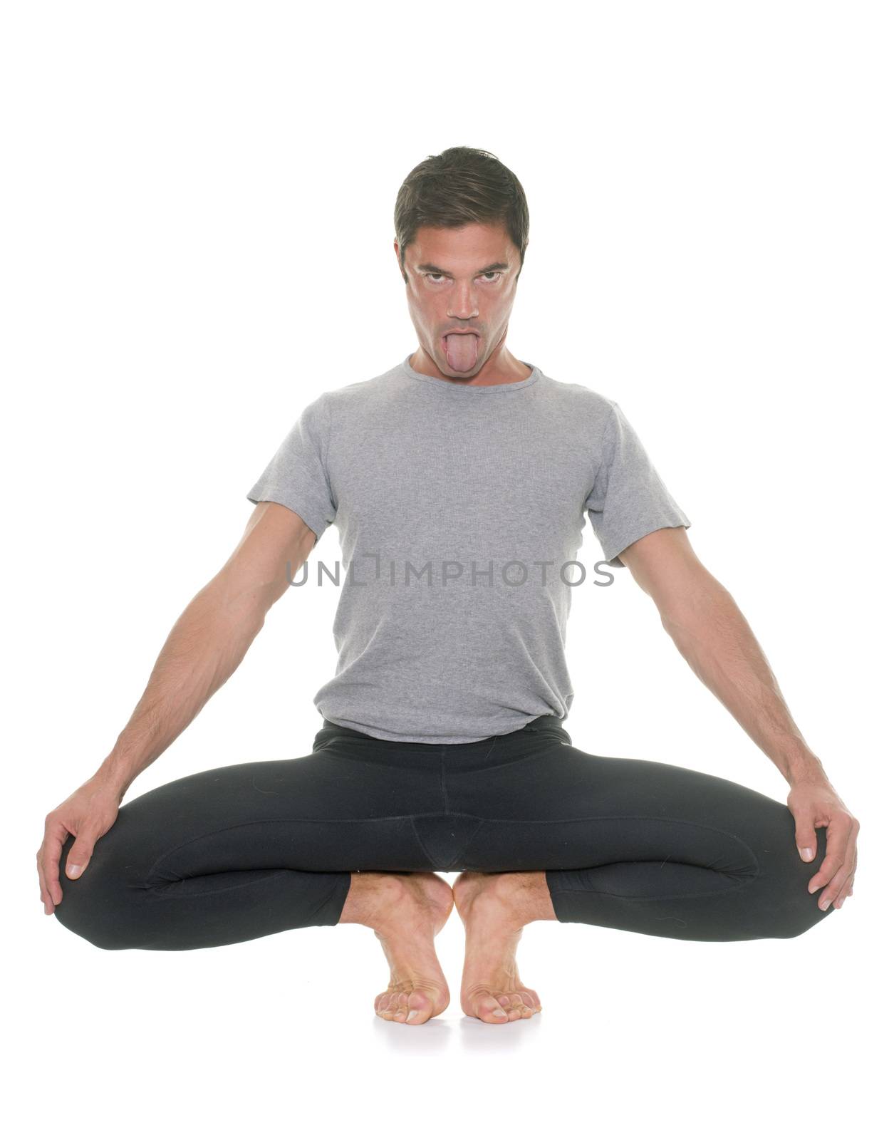 yoga man in front of white background