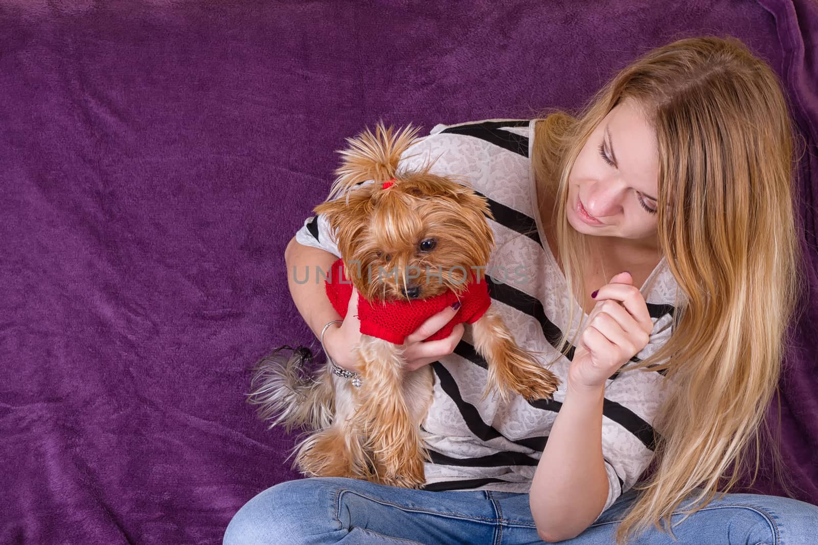 Cheerful beautiful young girl having fun with dog by victosha