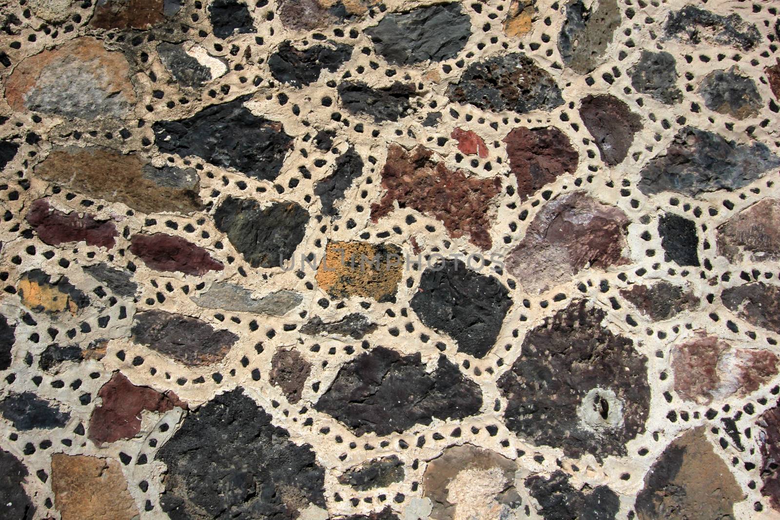 Stones at the wall of the pyramid of the moon in Teotihuacan, Mexico