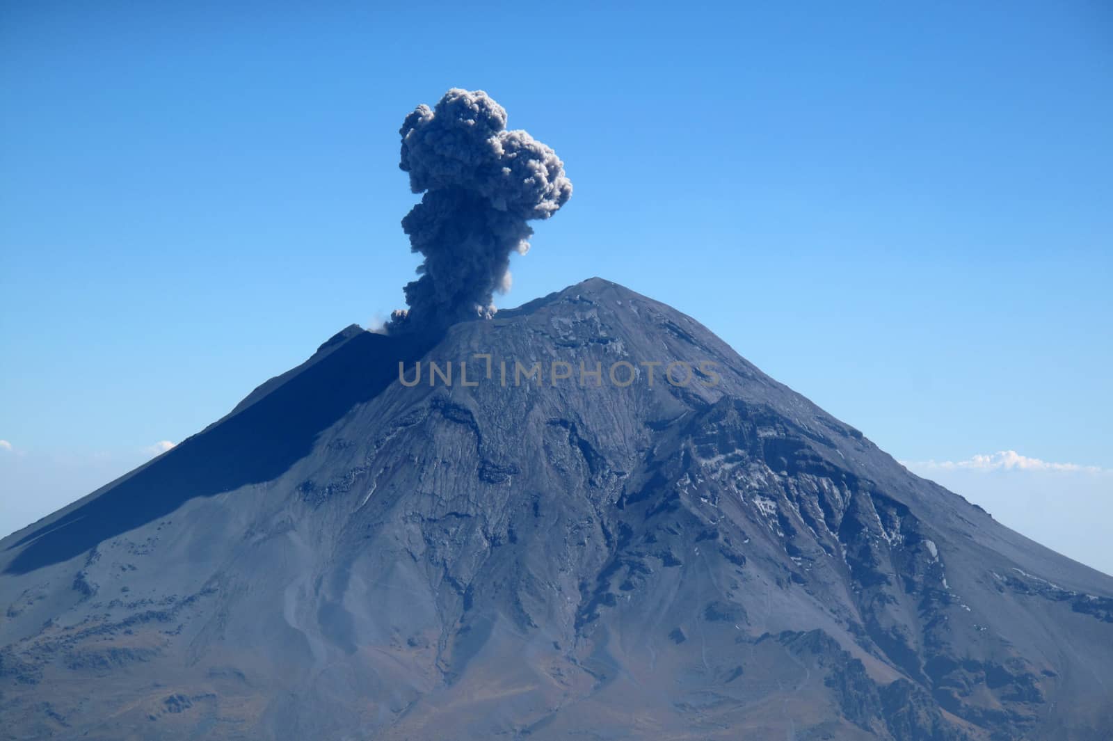 Active Popocatepetl volcano in Mexico, one of the highest mountains in the country