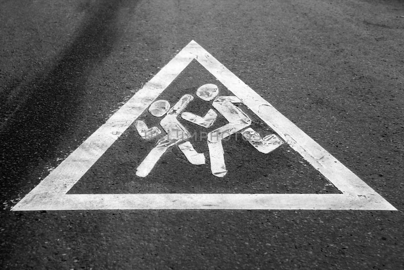 Road sign painted on the pavement