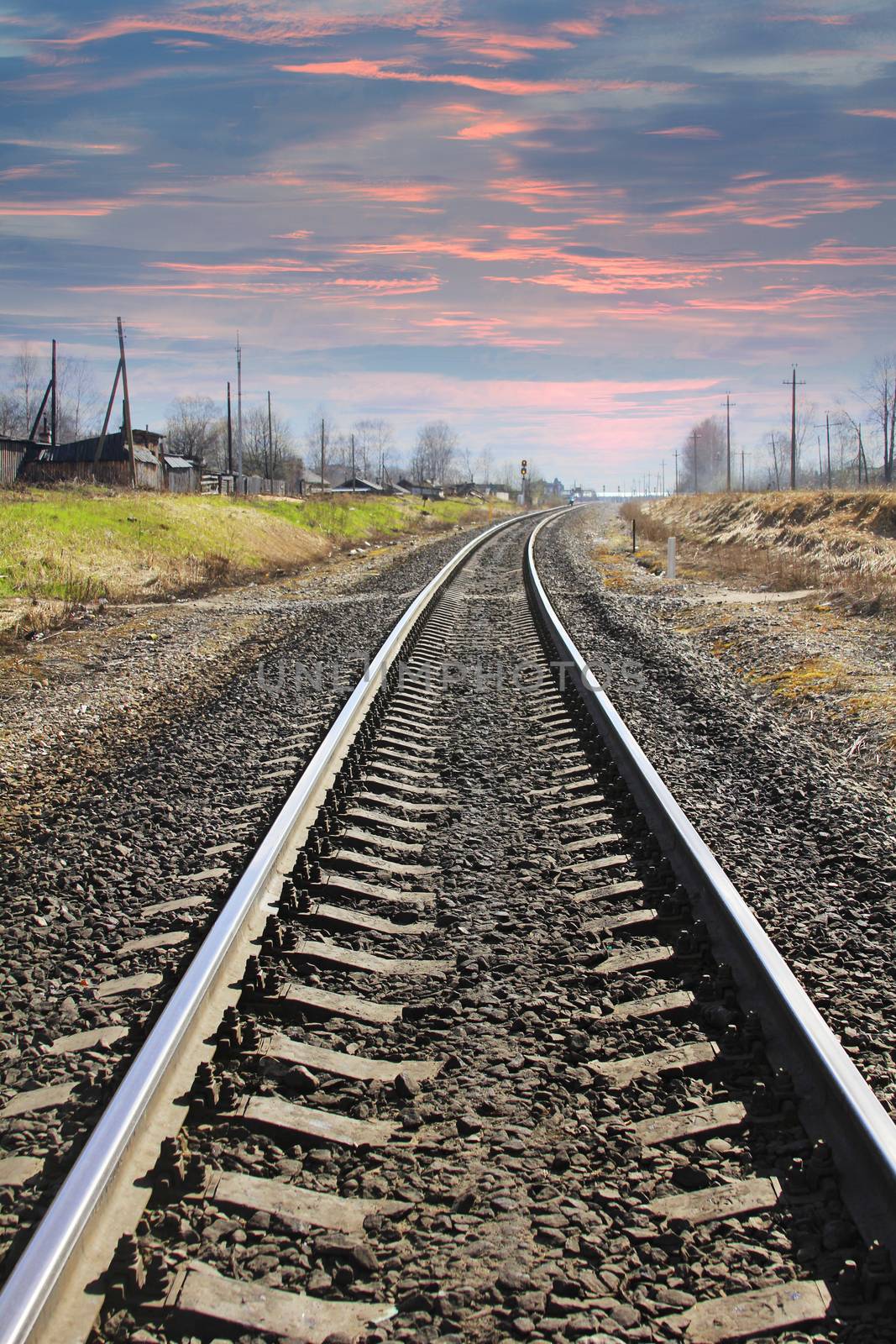 Railroad track disappearing into the distance.