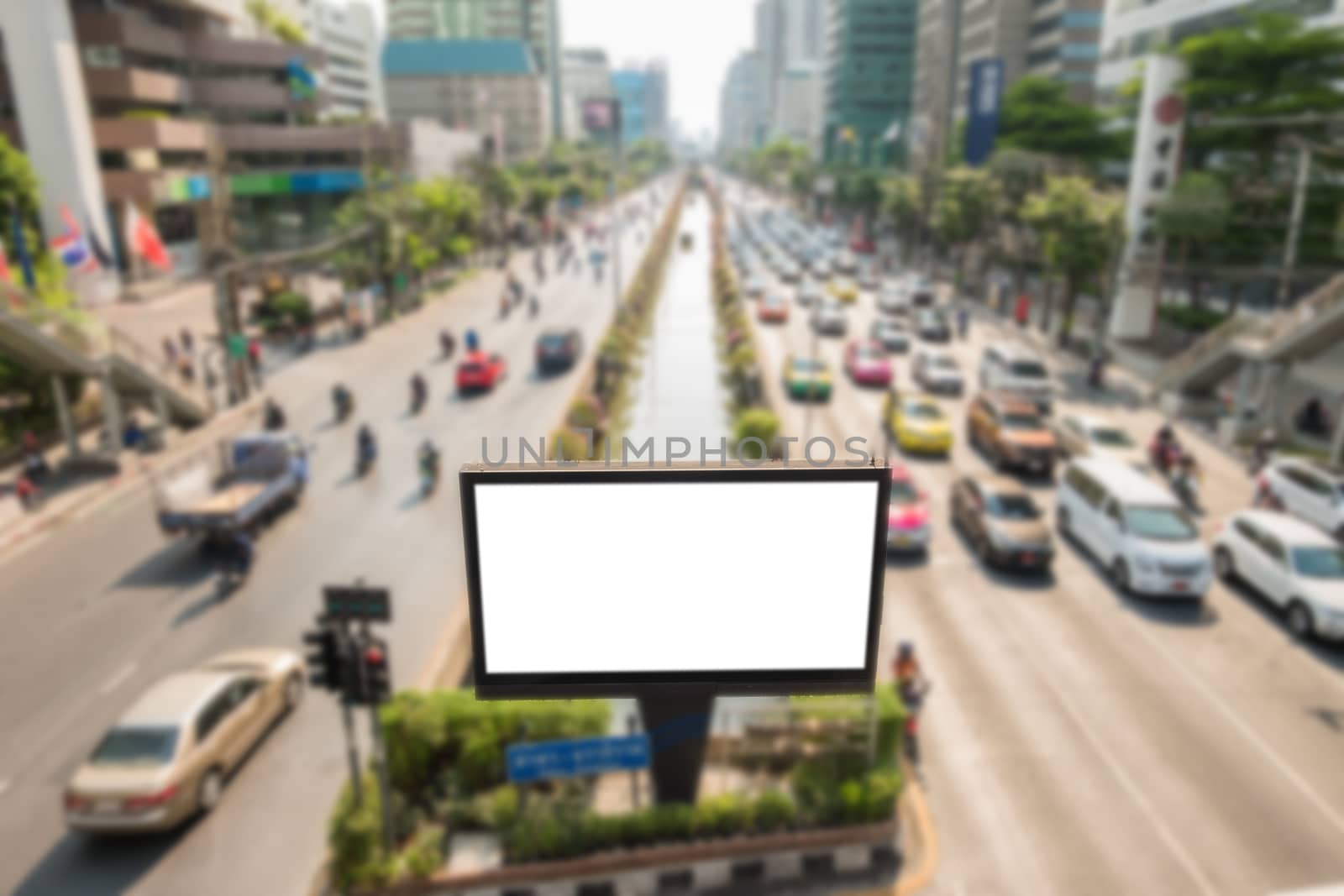 Blank billboard on road/effect blurred background. by Soranop01