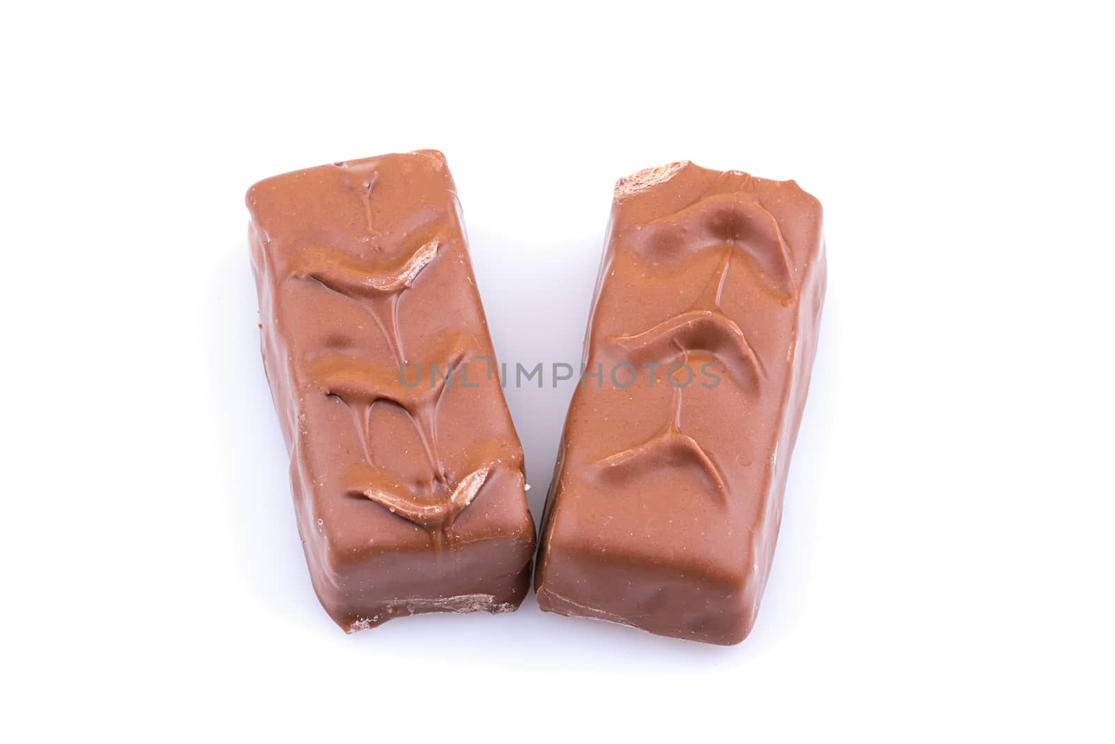 Chocolate bar with caramel isolated on white
