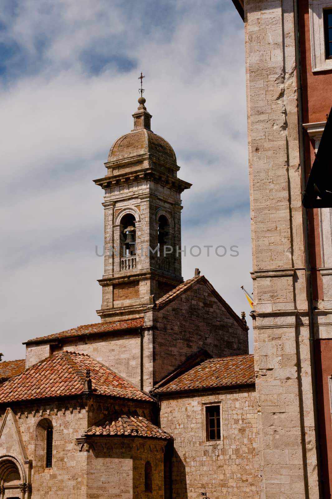 An old medieval roman church in San Quirico d'Orcia in Italy
