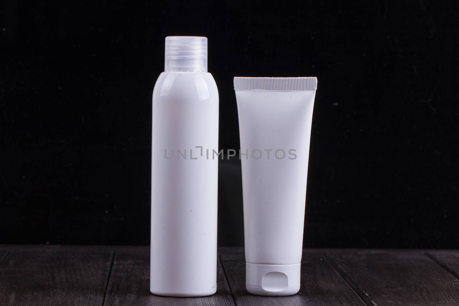 capacity for cosmetic on a beautiful wooden background, a jar for soap, place for text