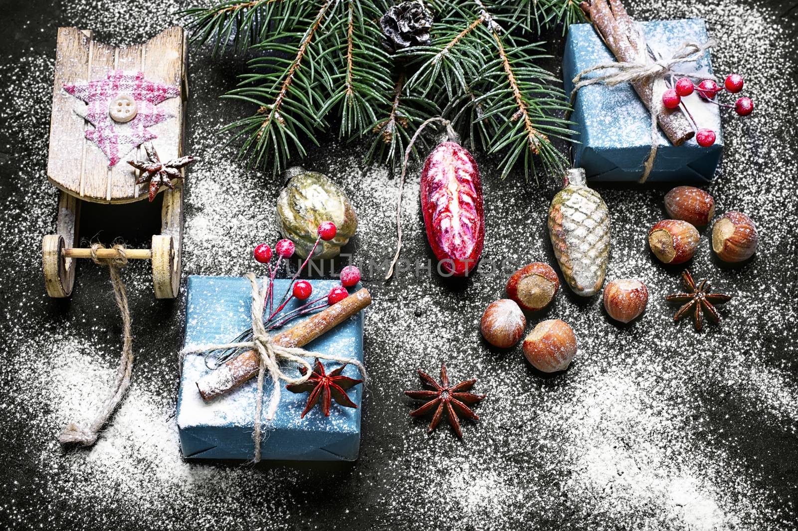 Box with Christmas present and Santa Claus's sledge