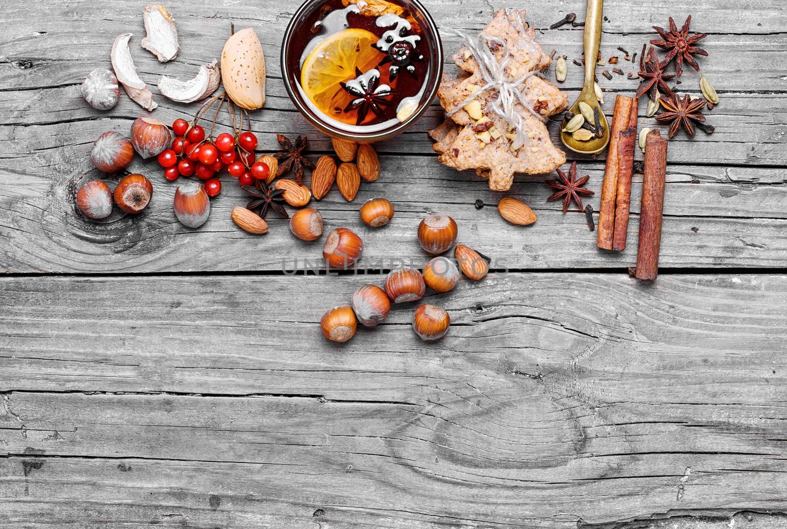 glass of mulled wine and spice rack for beverage