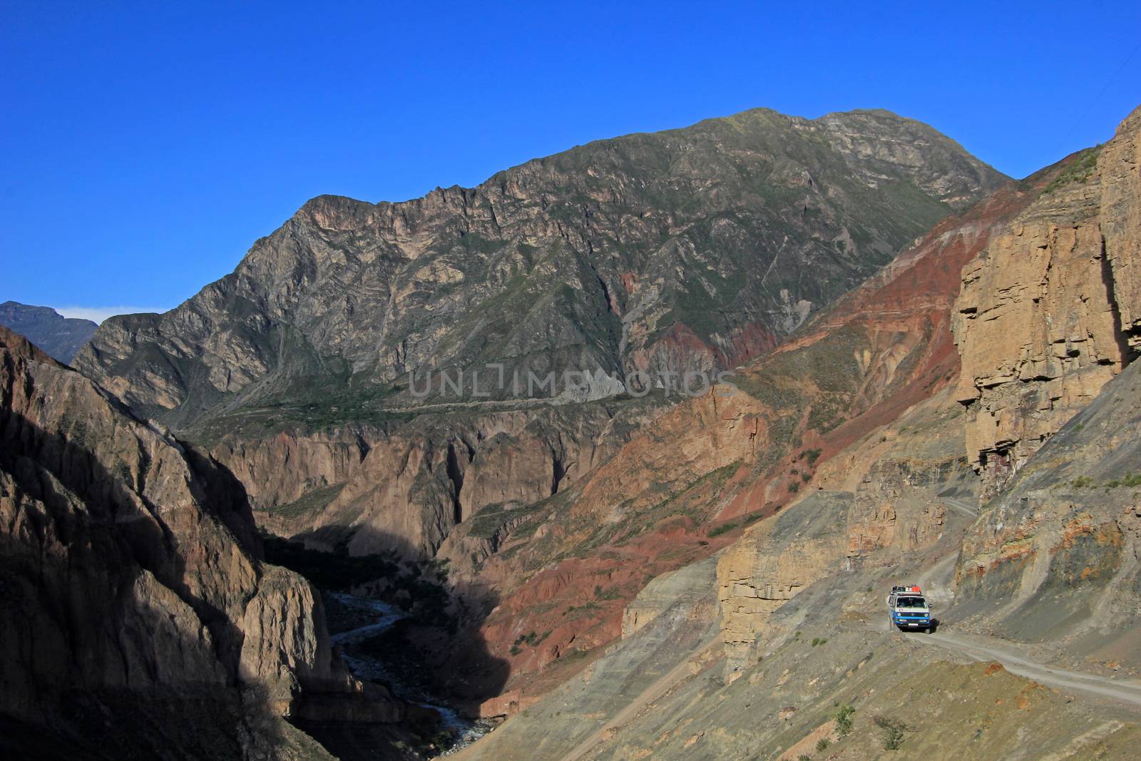 Cotahuasi Canyon Peru, van on road in canyon, one of the deepest and most beautiful canyons in the world