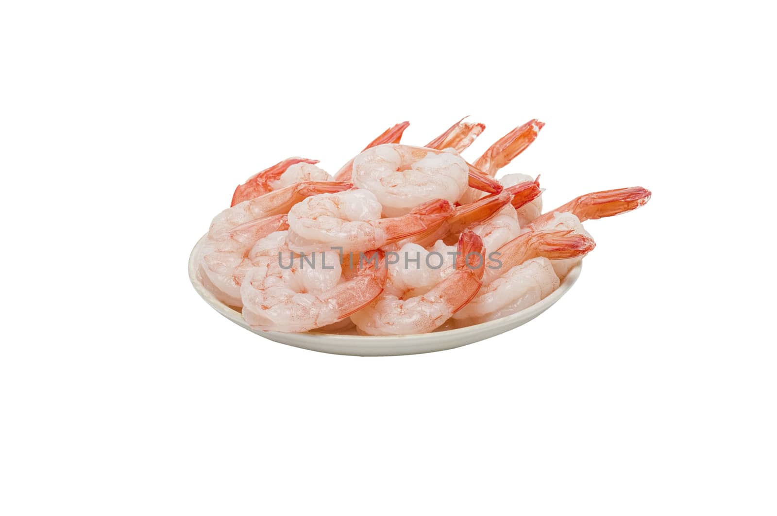 Red peeled prawns lie on a saucer isolated on white background