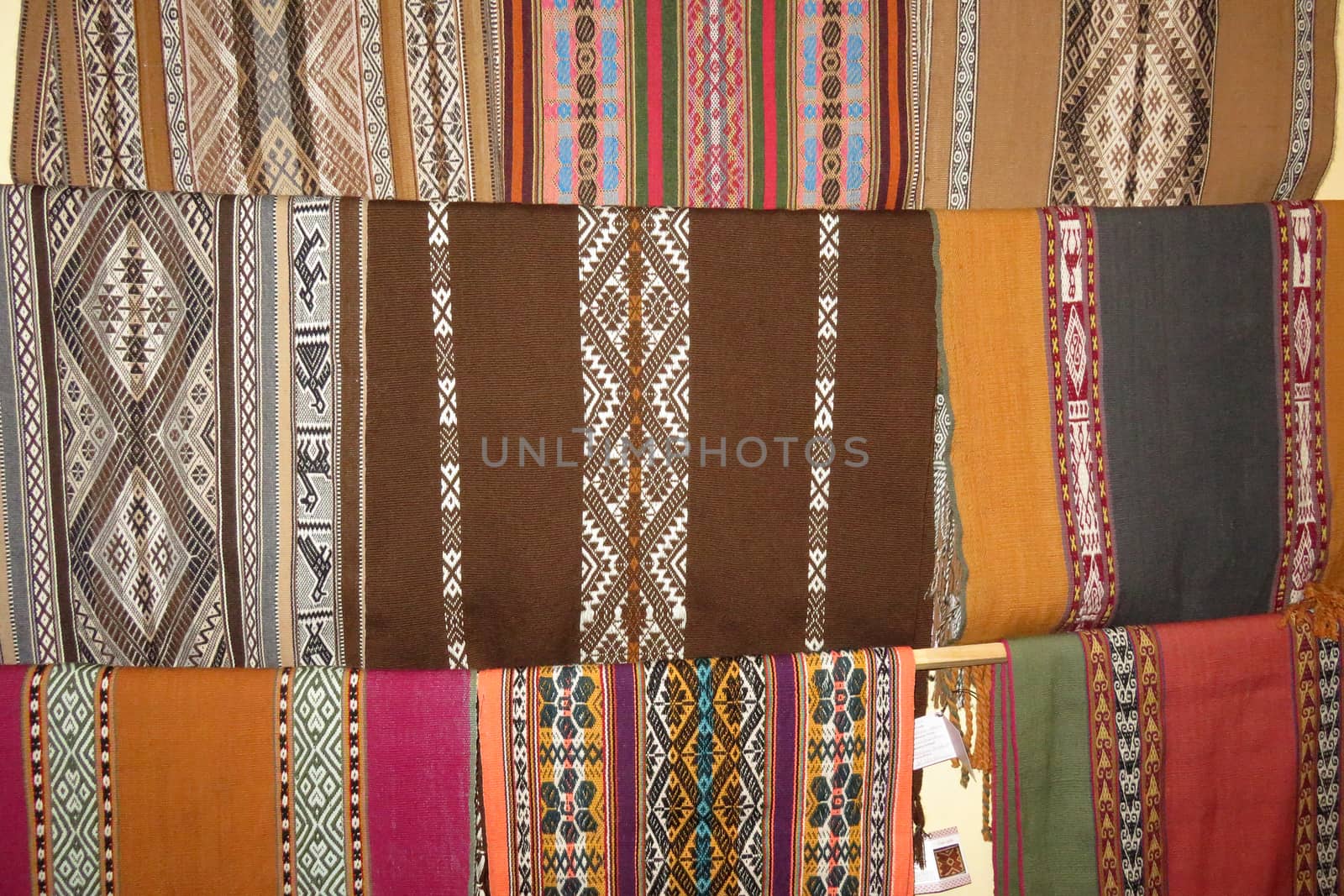 Details shot of wool fabric with colorful pattern, inca indian pattern.