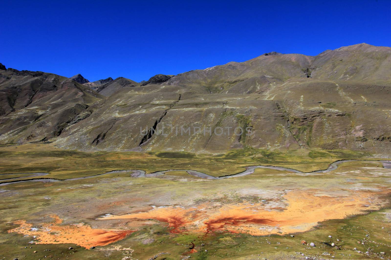 Nice orange sulfur stream in the andean mountains of Peru