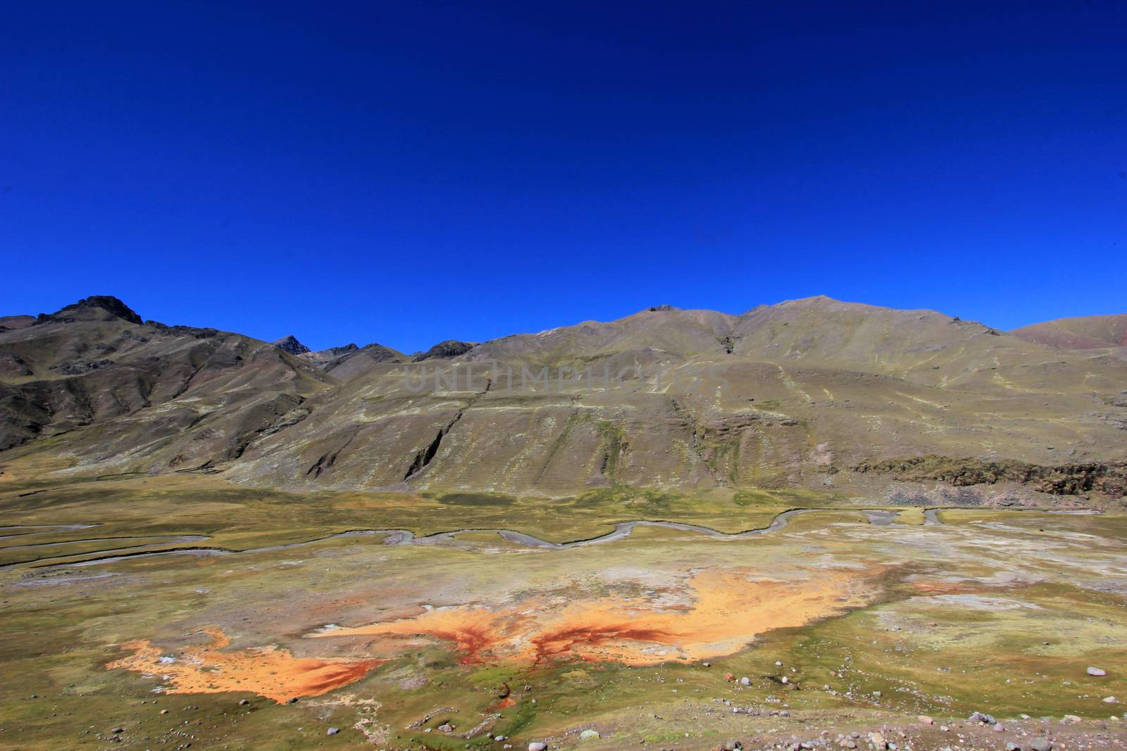 Nice orange sulfur stream in the andean mountains of Peru