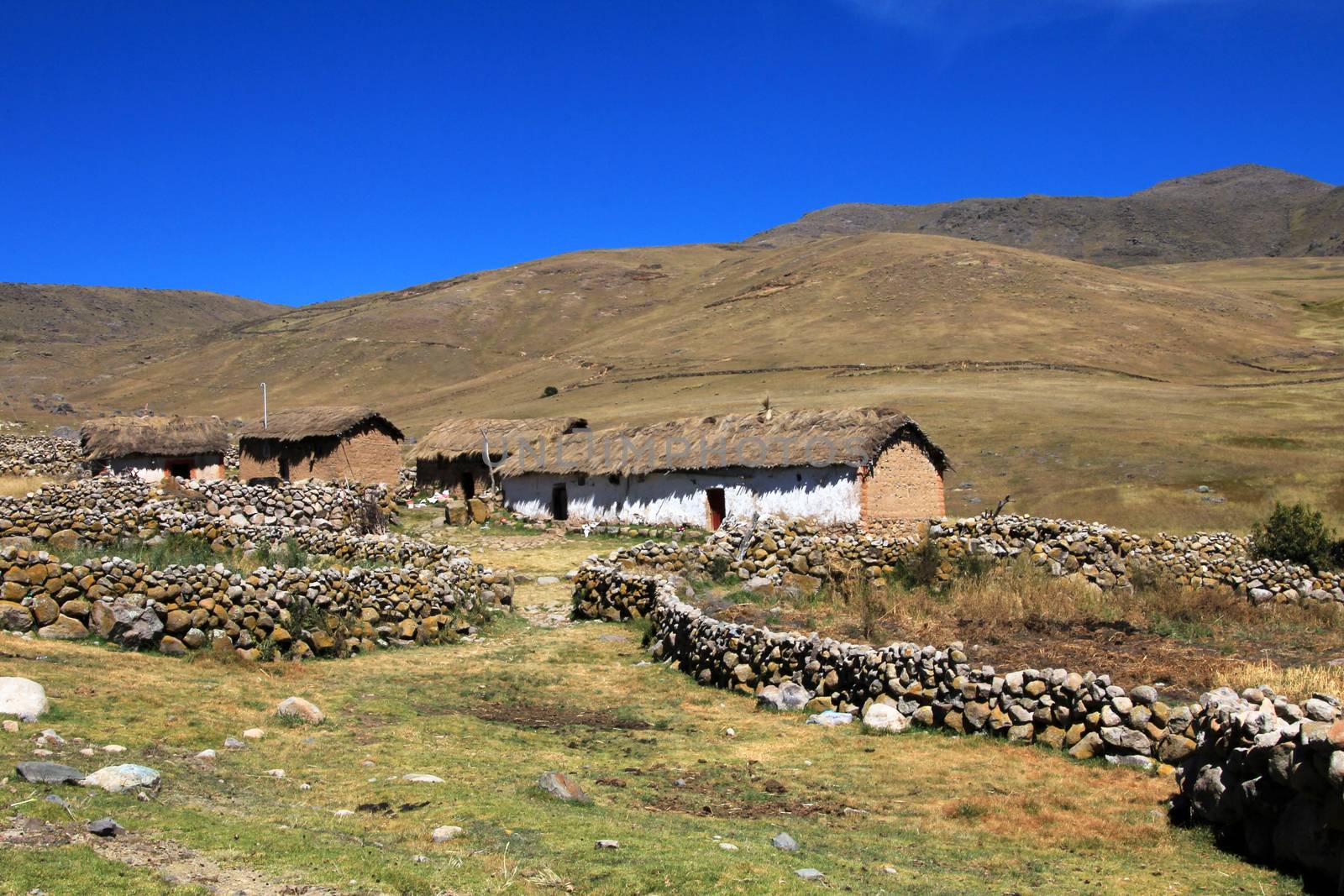 Typical adobe house in the andean mountains of Peru near Cusco