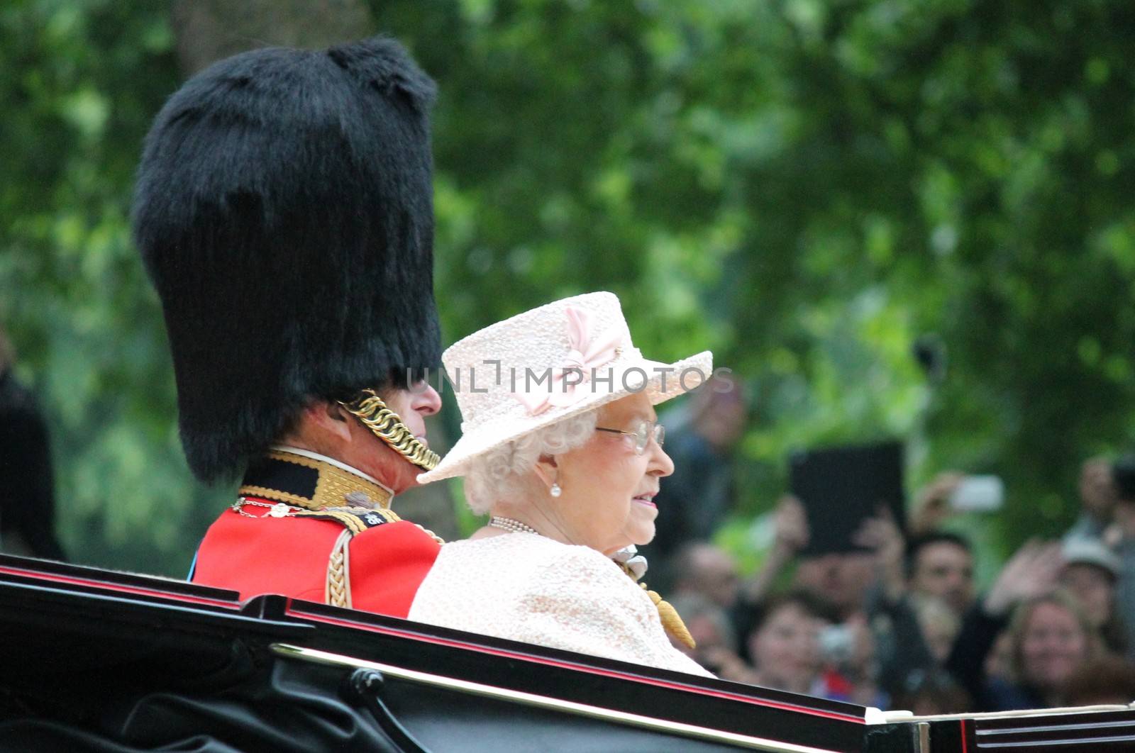 London, UK - June 13 2015: The Queen Elizabeth and Prince Phillip appear during Trooping the Colour ceremony by cheekylorns