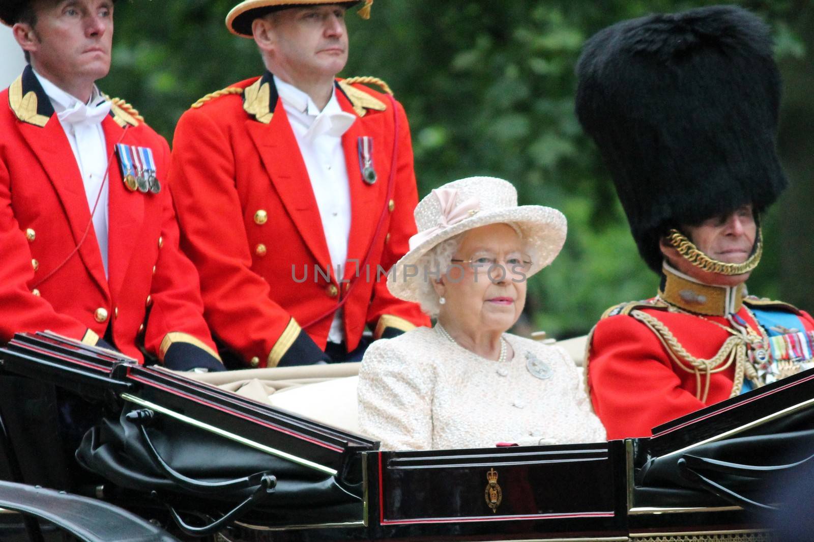 London, UK - June 13 2015: The Queen Elizabeth and Prince Phillip appear during Trooping the Colour ceremony by cheekylorns