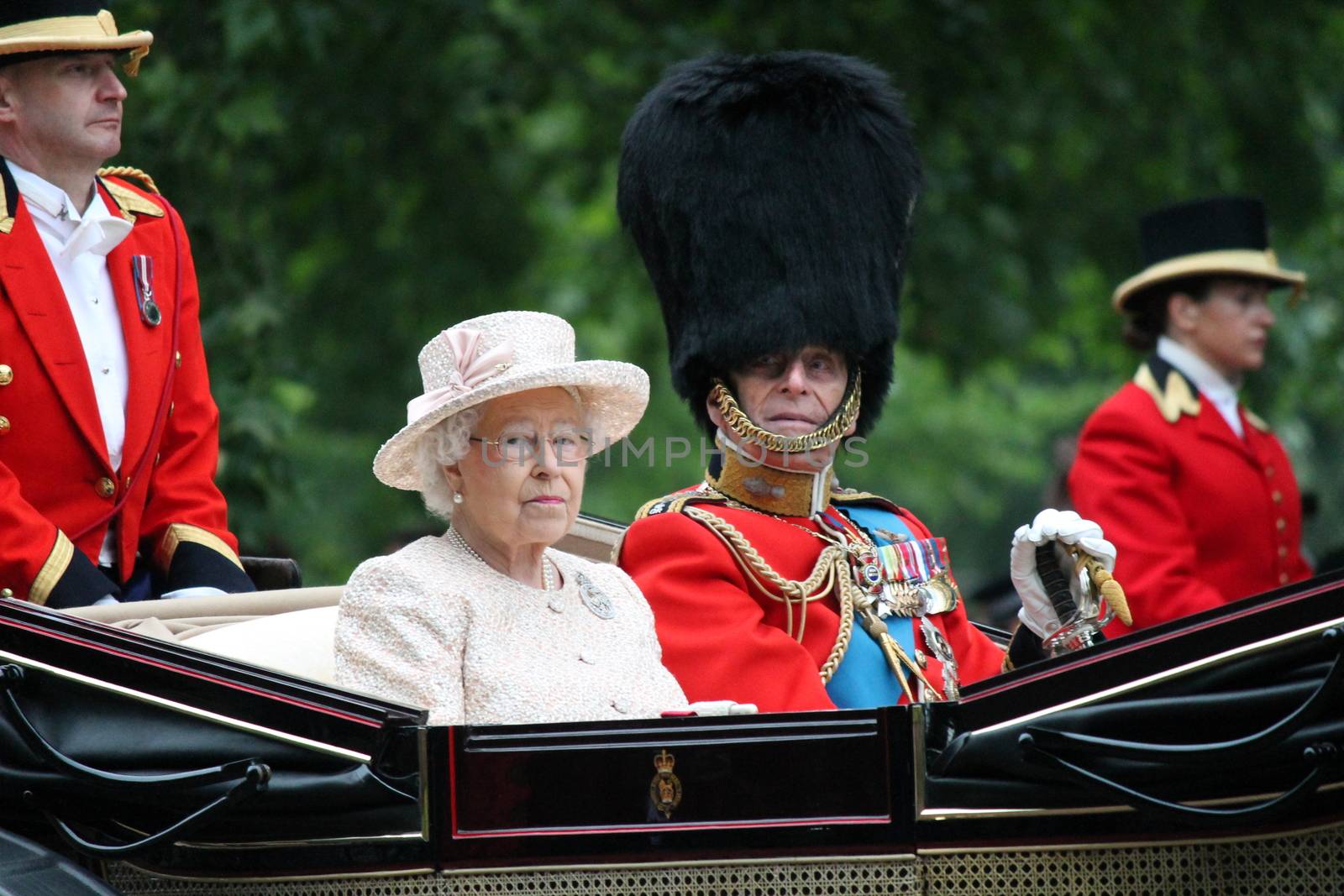 London, UK - June 13 2015: The Queen Elizabeth and Prince Phillip appear during Trooping the Colour ceremony by cheekylorns