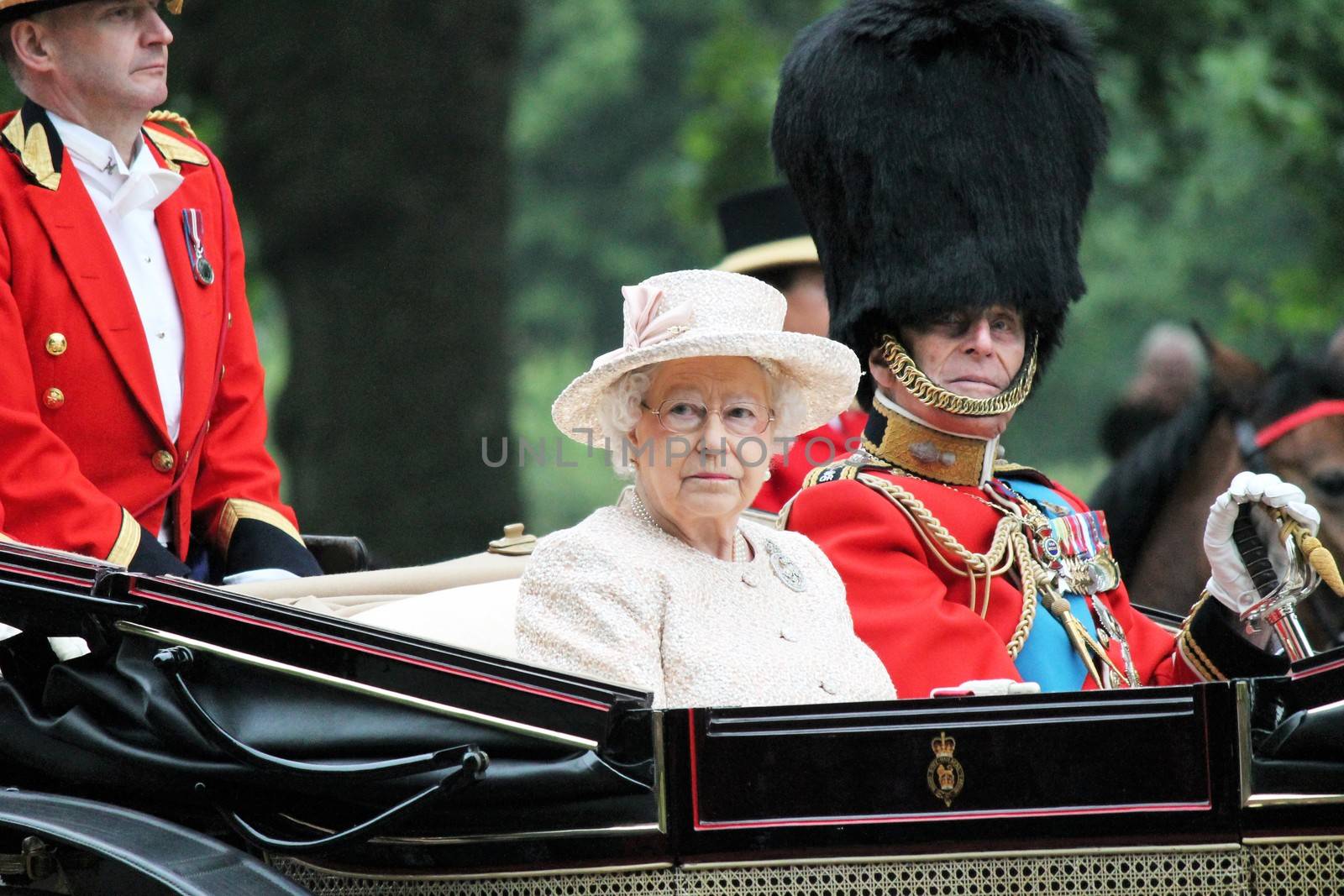 London, UK - June 13 2015: The Queen Elizabeth and Prince Phillip appear during Trooping the Colour ceremony by cheekylorns