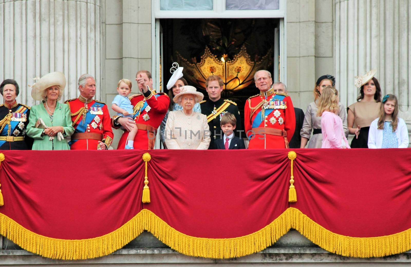 LONDON, UK - JUNE 13: The Royal Family appears on Buckingham Palace balcony during Trooping the Colour ceremony, Prince Georges first apperance on Balcony, on June 13, 2015 in London, England, UK