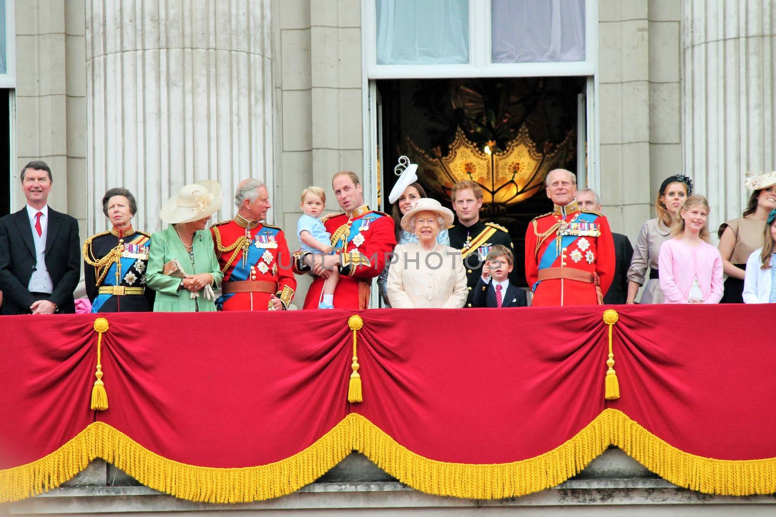 LONDON, UK - JUNE 13: The Royal Family appears on Buckingham Palace balcony during Trooping the Colour ceremony, Prince Georges first apperance on Balcony, on June 13, 2015 in London, England, UK by cheekylorns