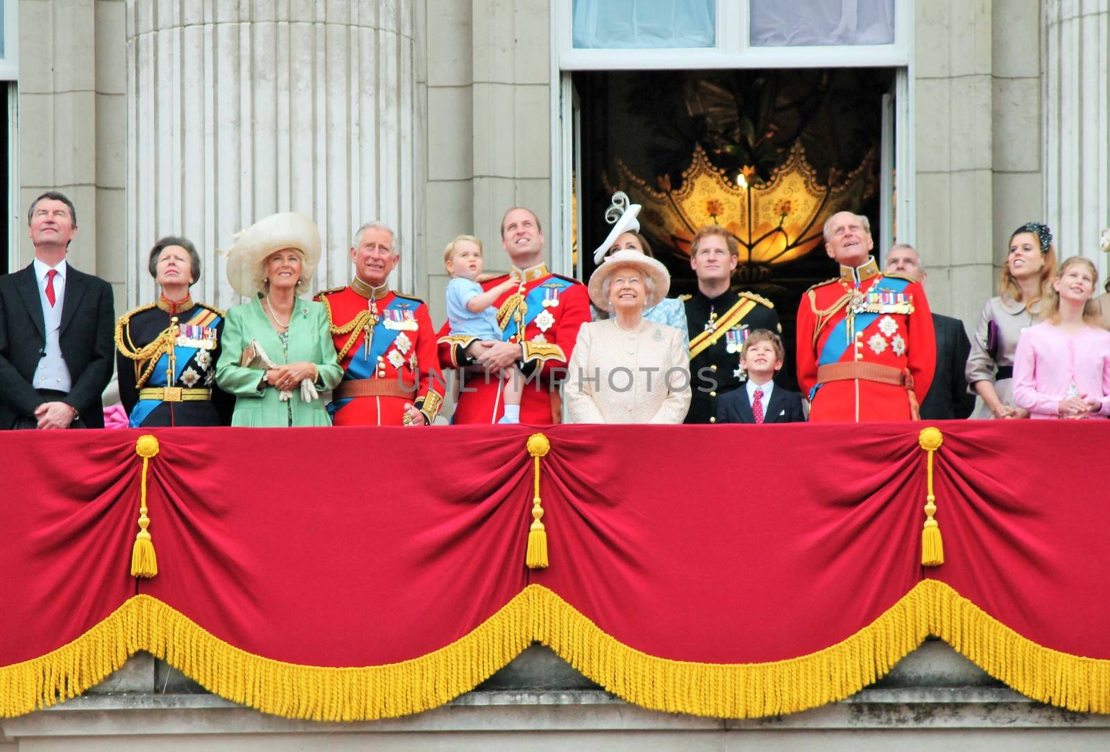 LONDON, UK - JUNE 13: The Royal Family appears on Buckingham Palace balcony during Trooping the Colour ceremony, Prince Georges first apperance on Balcony, on June 13, 2015 in London, England, UK by cheekylorns