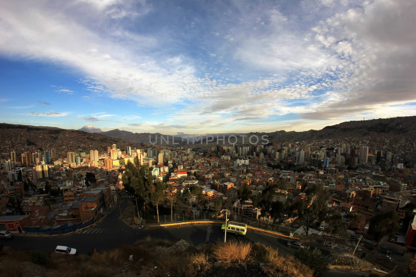 Panorama of night La Paz, Bolivia, Illimani mountain in the Background