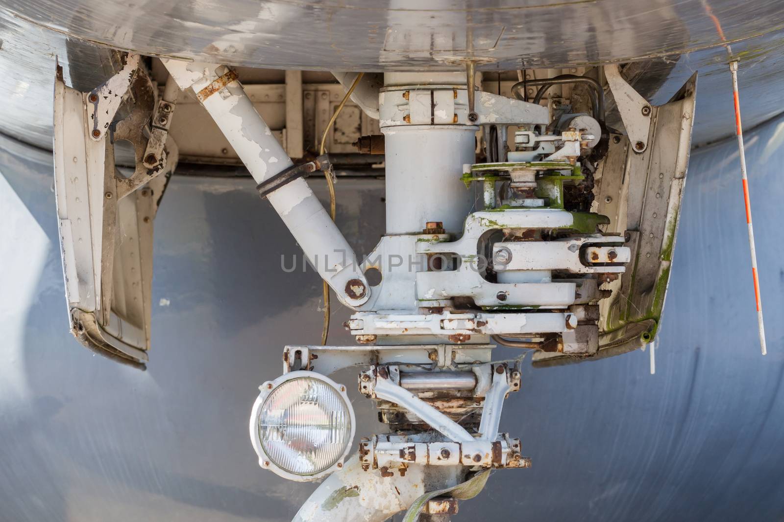 Close up aircraft nose landing gear on the tarmac