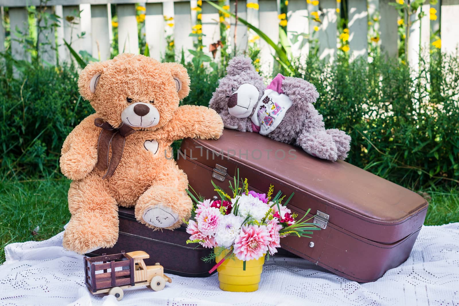 Toy bears sitting on suitcases by okskukuruza