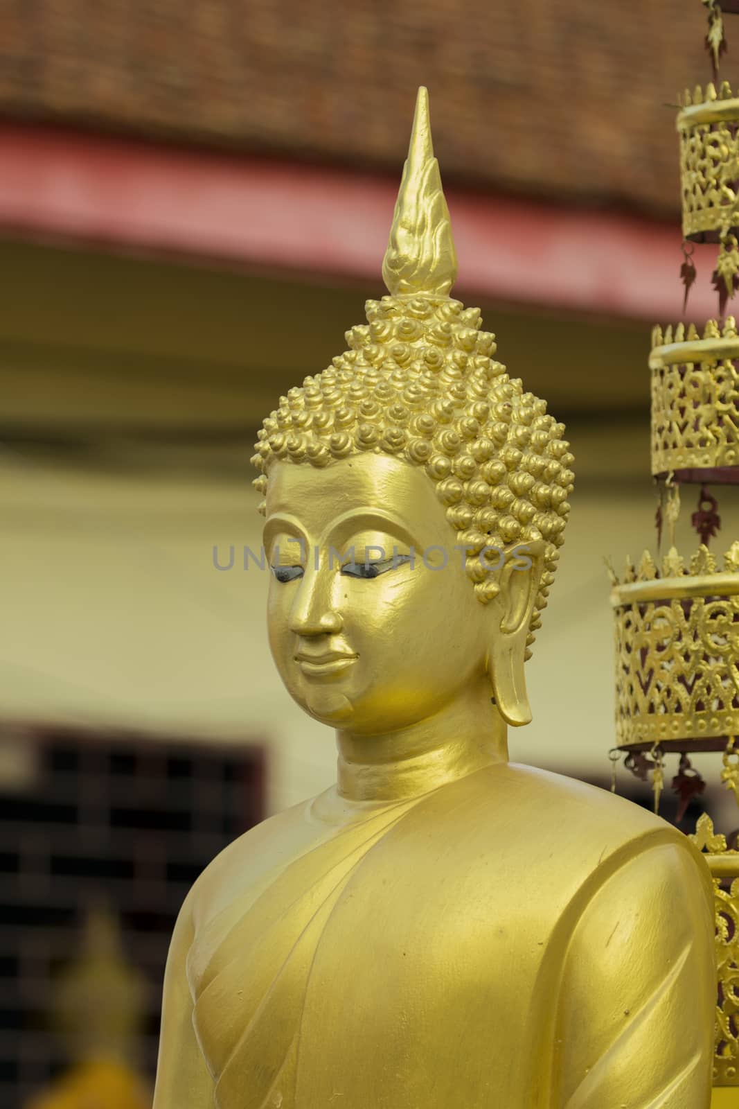 Image of golden buddha statue in temple in province tak. Thailand. (Wat Phra Mahathat)