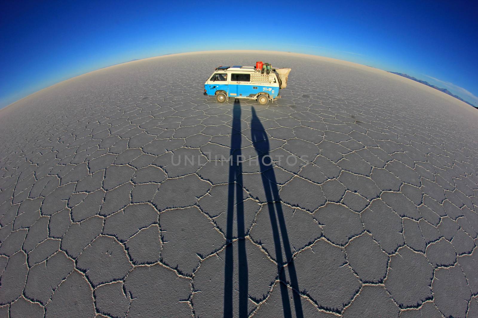 Van on Salar de Uyuni, salt lake, is largest salt flat in the world, altiplano, Bolivia, South America, fisheye perspective