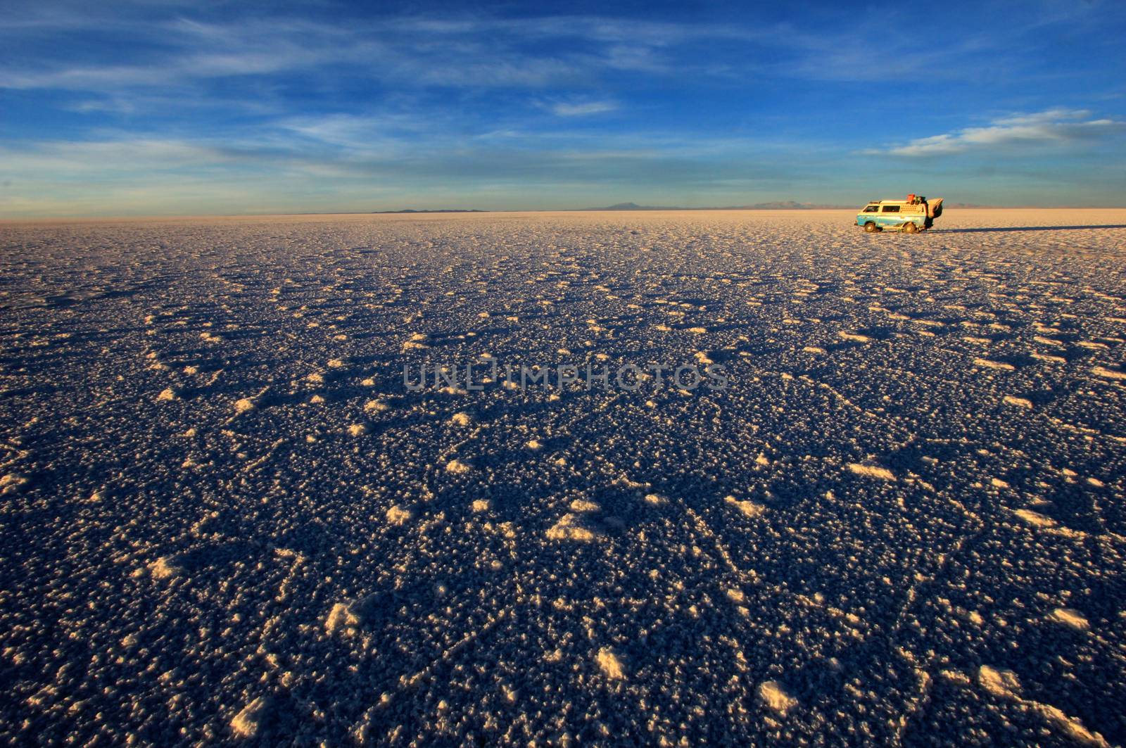 Van on Salar de Uyuni, salt lake, is largest salt flat in the world, altiplano, Bolivia, South America