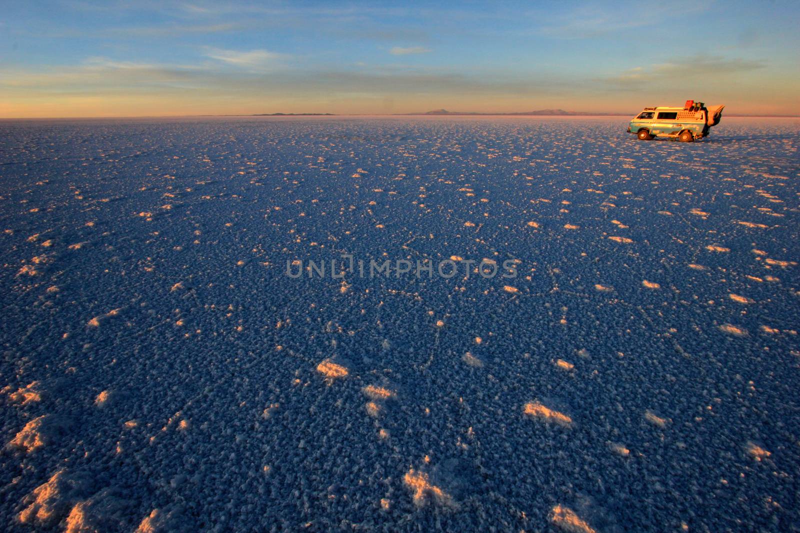 Van on Salar de Uyuni, salt lake, is largest salt flat in the world, altiplano, Bolivia, South America