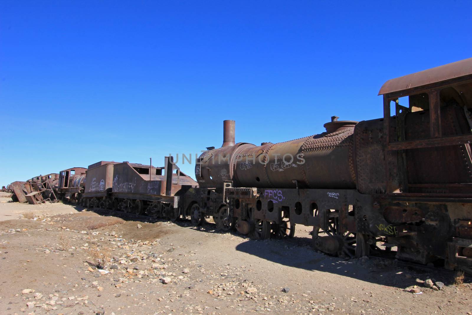 Graveyard of rusty old trains in the desert of Uyuni, Bolivia