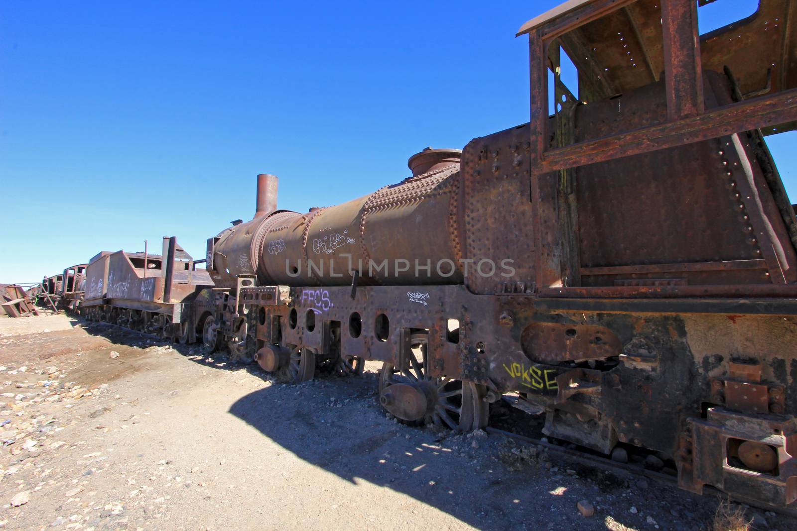 Graveyard of rusty old trains in the desert of Uyuni, Bolivia