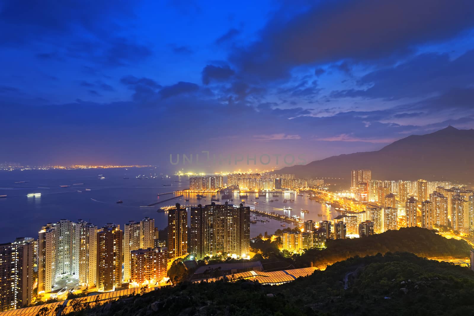 Hong Kong Tuen Mun skyline and South China sea at night