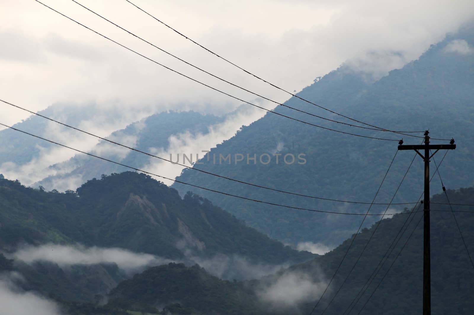 Cloudforest Ecuador mountains with phone mast in front. On the way down to the amazonas basin.