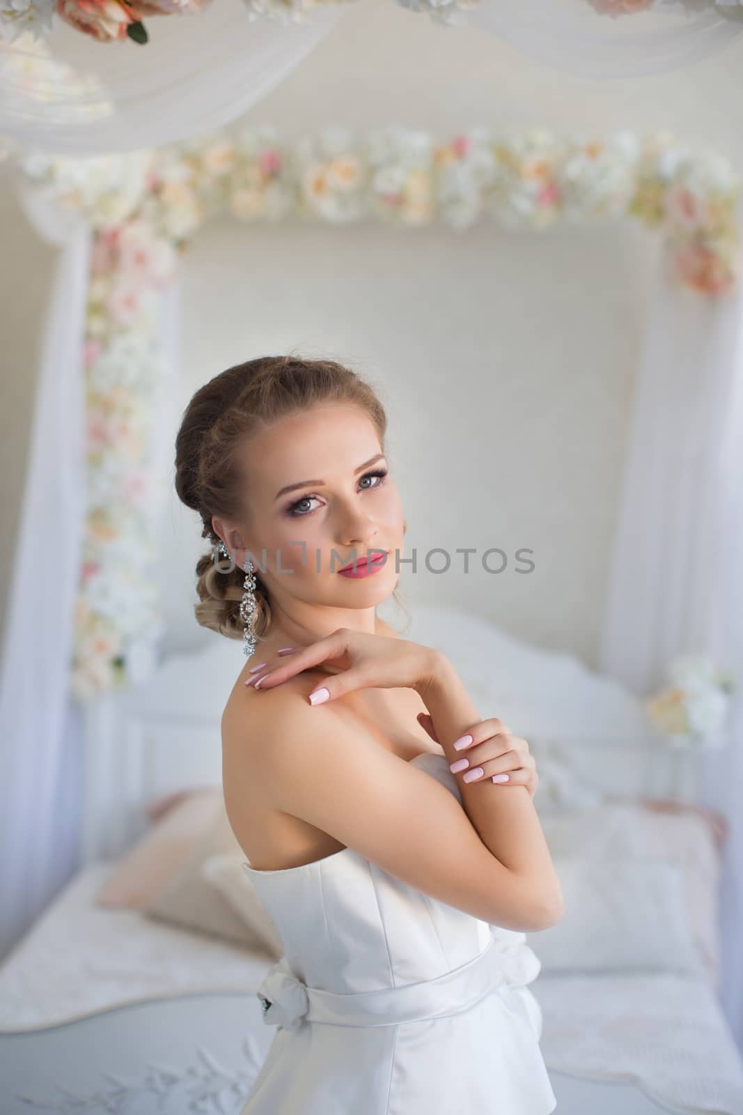 Portrait of a girl in a white dress close-up