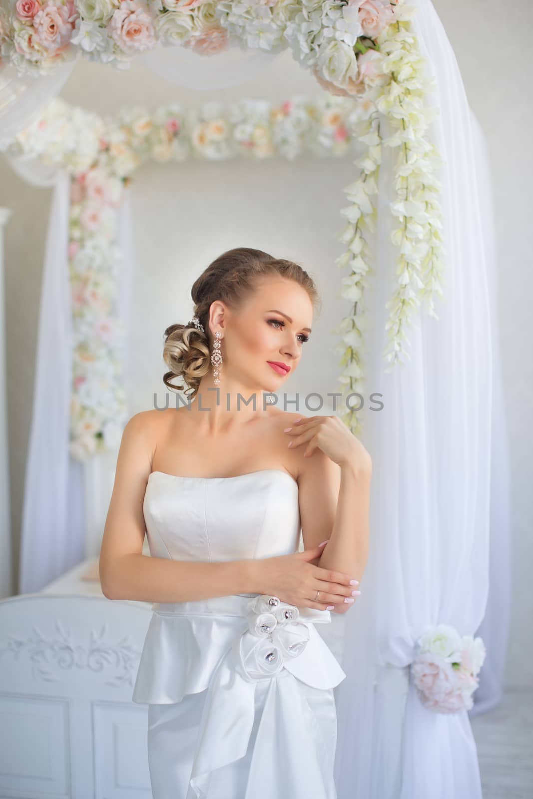 Portrait of a girl in a white dress close-up