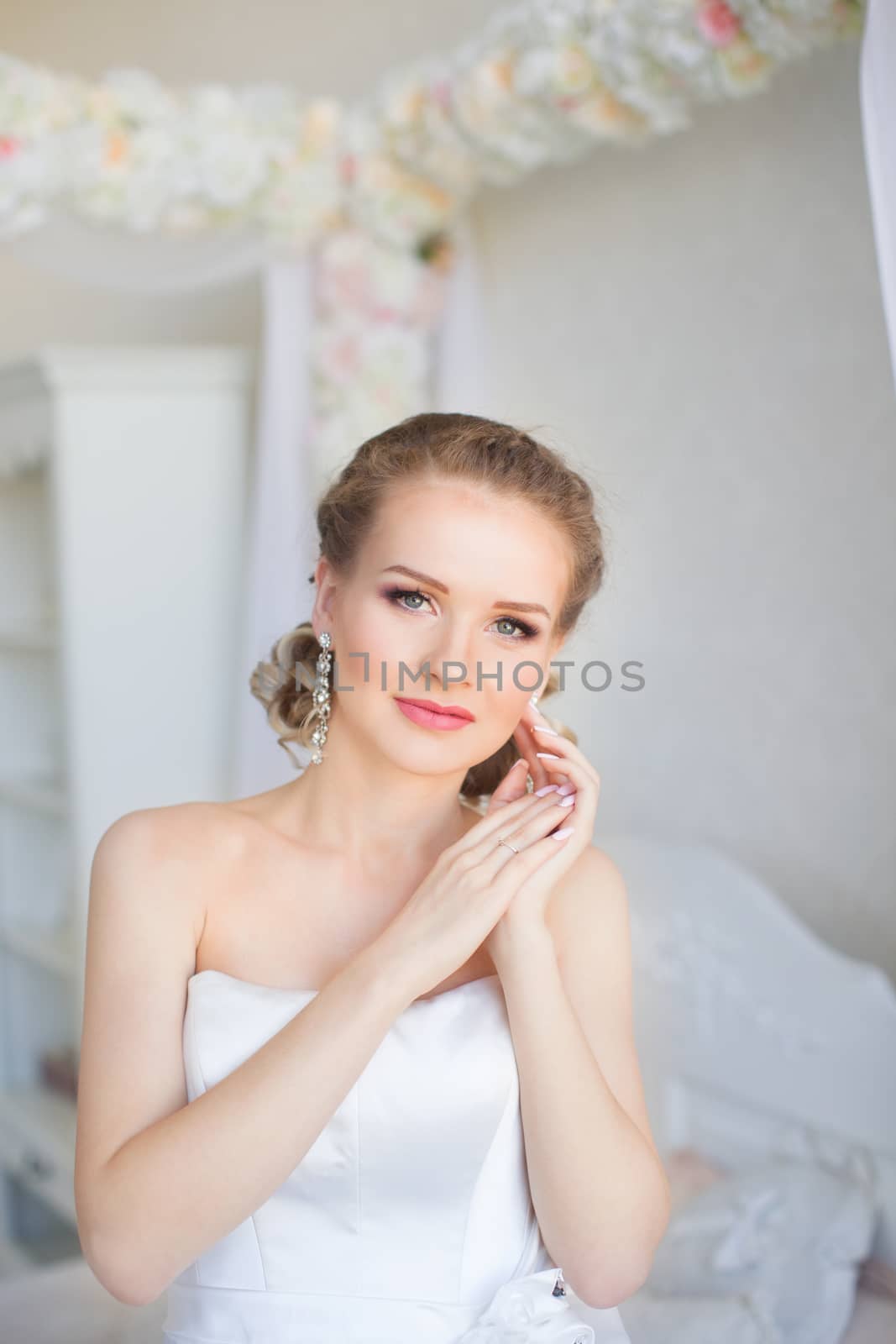 Portrait of a girl in a white dress close-up