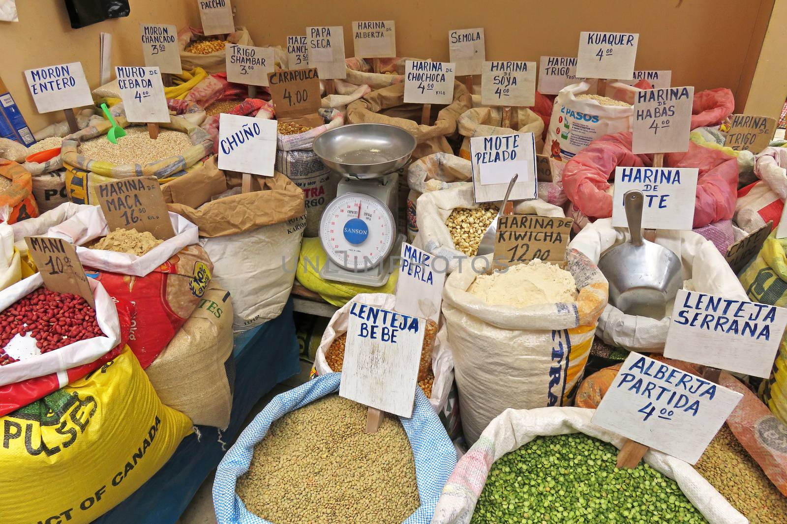 Bags with flour, maize and others at the market in Celendin, Peru, South America.