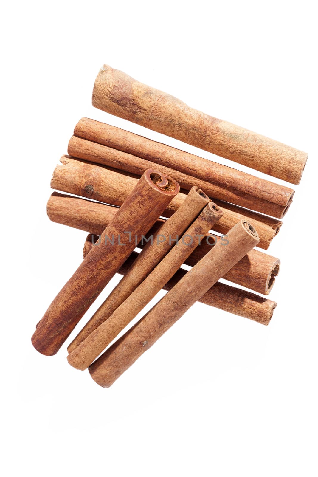 Cinnamon sticks isolated on white background, close up by mychadre77