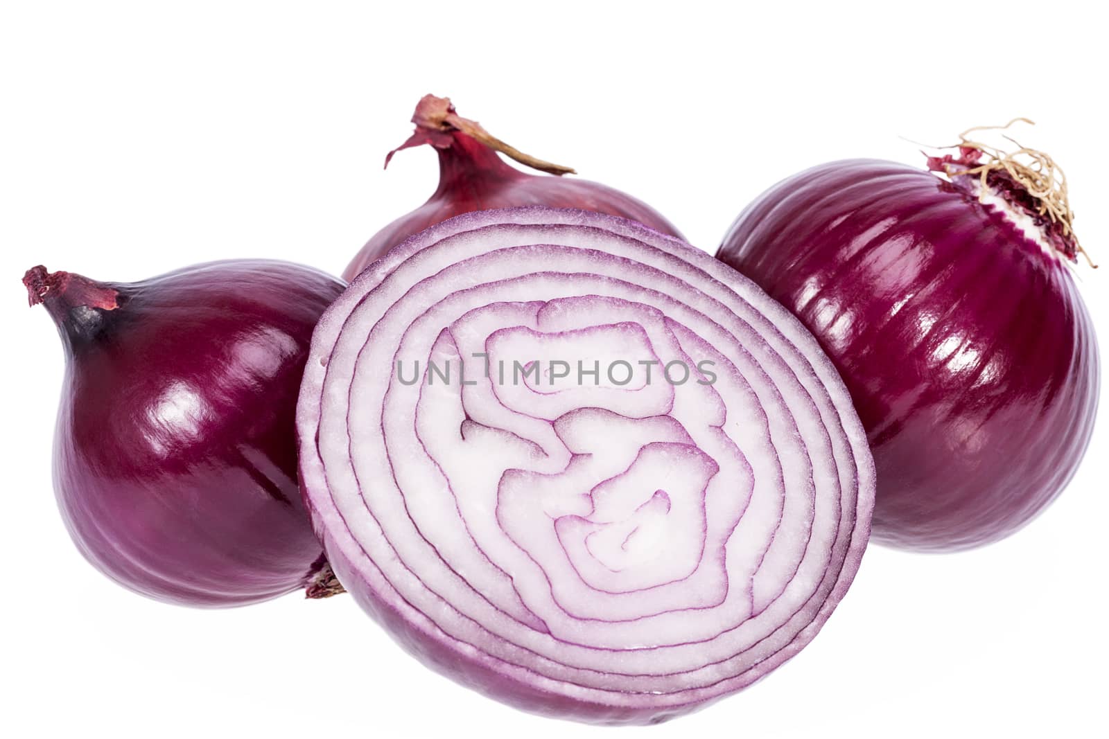 Group of red onions isolated on white background closeup