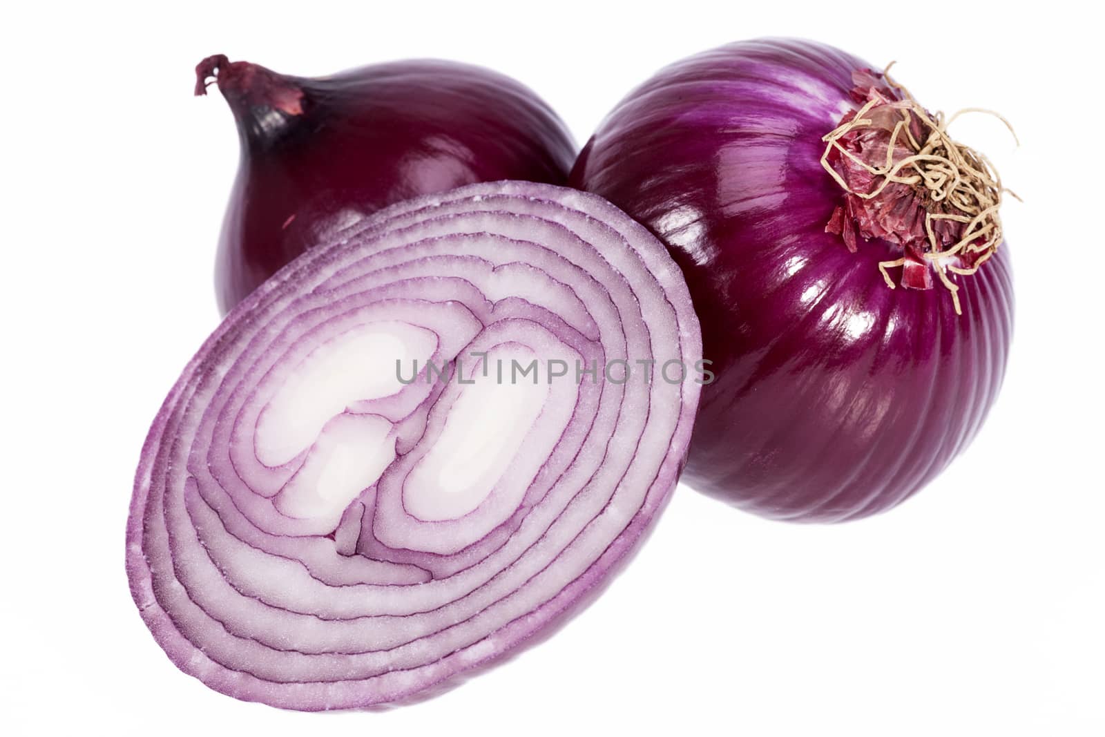 Group of red onions isolated on white background, closeup